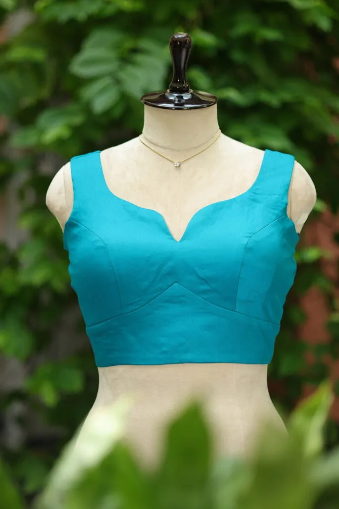 sabyasachi cut – Blouse in Rama green, front view | Tilattama