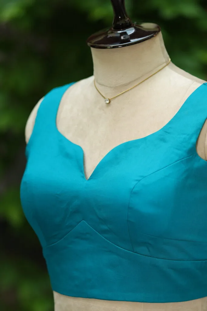 sabyasachi cut – Blouse in Rama green, side view | Tilattama