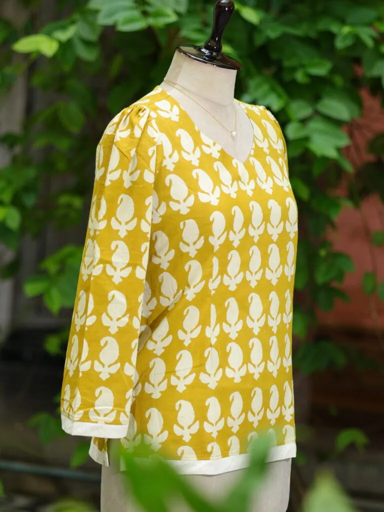 Bagru Bliss – Kurti in Neon Pista, side view | Tilattama