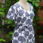 Canvas Curve – Kurti in white, side view | Tilattama