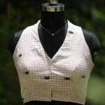 Check Jamdani Celeb Halter – Blouse in white & black, front view | Tilattama