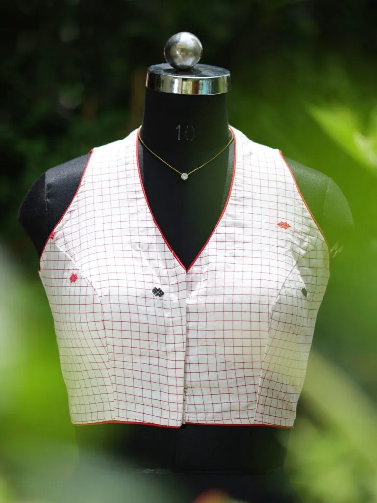 Check Jamdani Celeb Halter – Blouse in white & red, front view | Tilattama