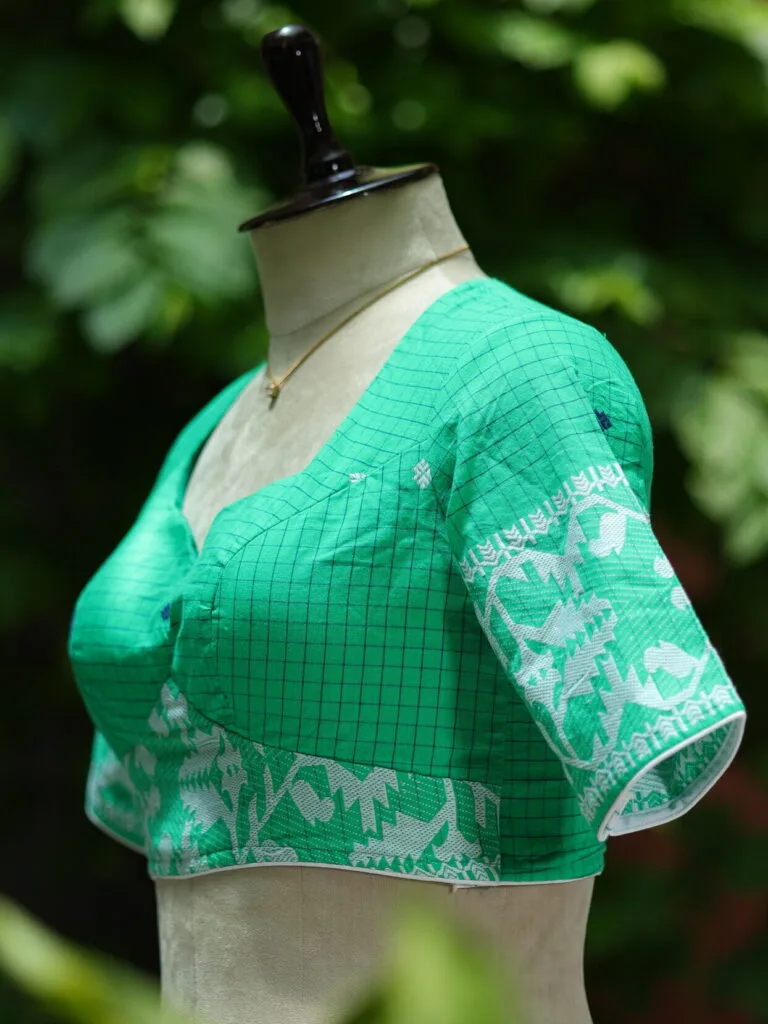 Jaharat jamdani – Blouse in parrot green, side view | Tilattama