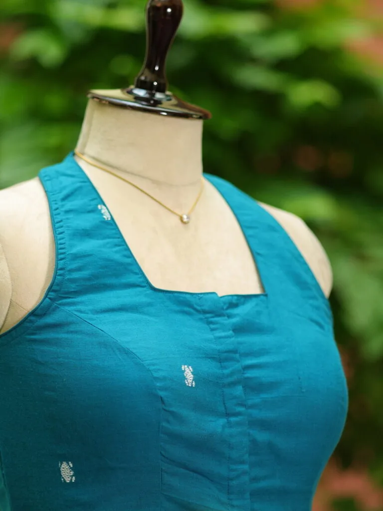 Jamdani Hakoba Halter – Blouse in Rama green, side view | Tilattama