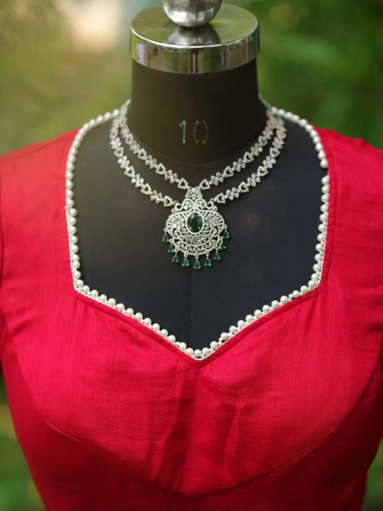 Moti Bichitra Backless – Blouse in Rani | Tilattama
