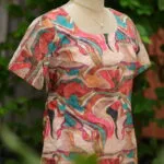 Multi Floral Chikan – Kurti in Cream, side view | Tilattama