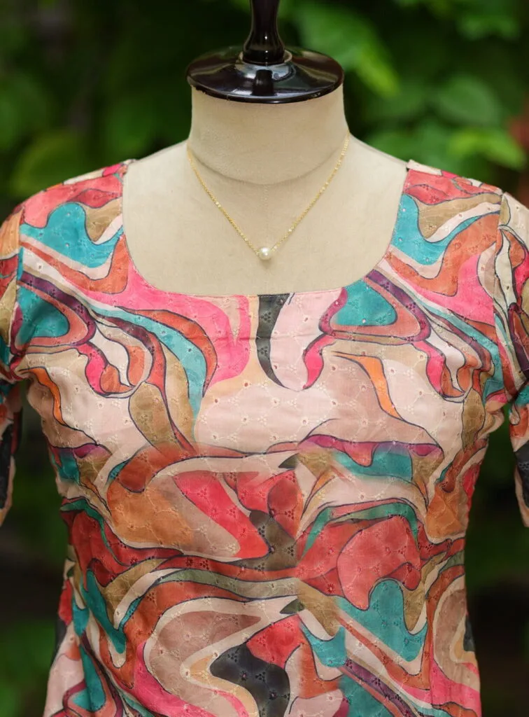 Multi Floral Chikan – Kurti in Cream | Tilattama