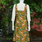 Pen Kalamkari Baby Collar One Piece – Kurti in Neon Pista, back view | Tilattama