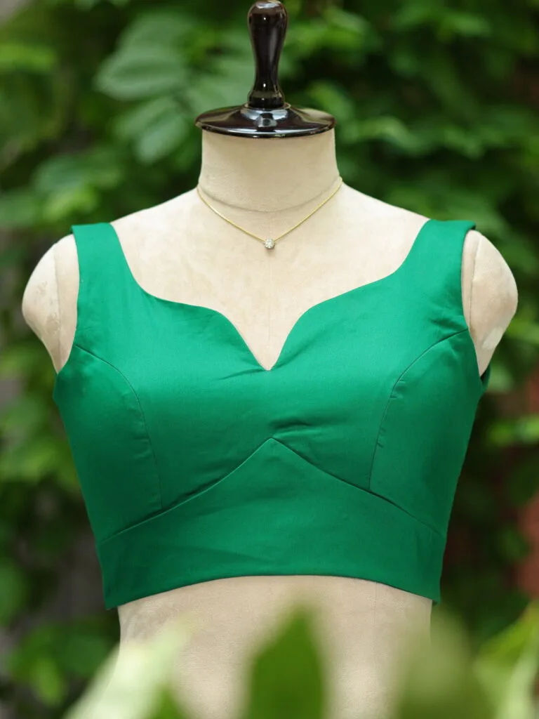 sabyasachi cut – Blouse in Green, front view | Tilattama