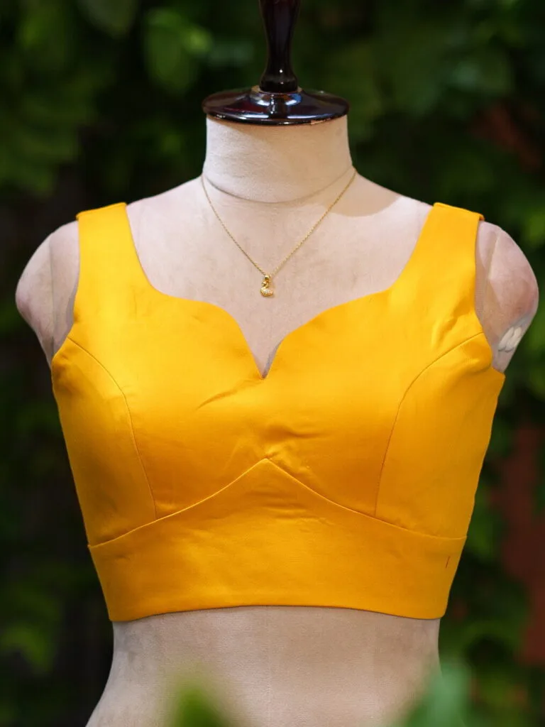 sabyasachi cut – Blouse in Mango yellow, front view | Tilattama