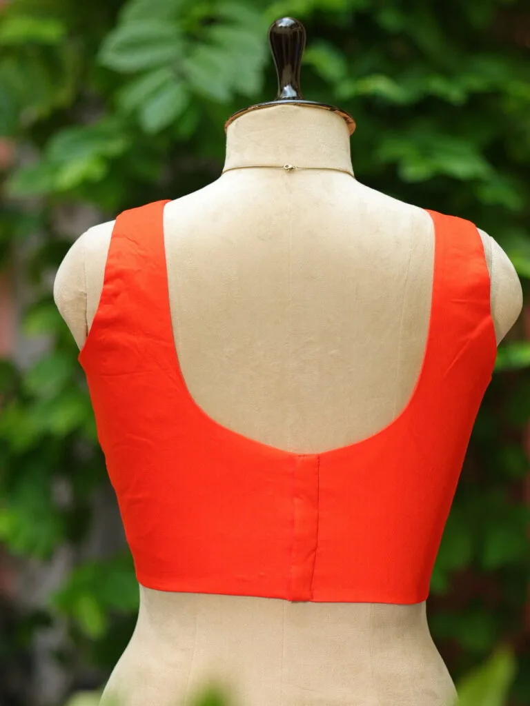 sabyasachi cut – Blouse in Orange, back view | Tilattama