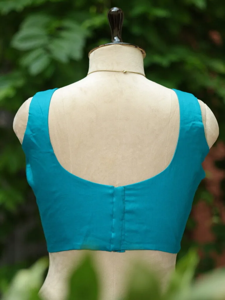 sabyasachi cut – Blouse in Rama green, back view | Tilattama