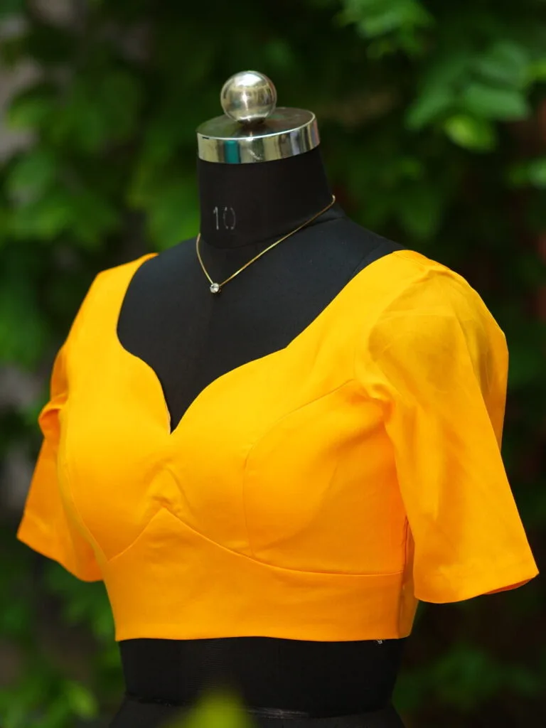 Sabyasachi G/S – Blouse in Mango yellow, side view | Tilattama