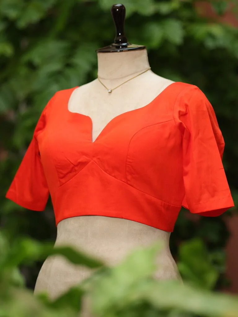 Sabyasachi G/S – Blouse in Orange, side view | Tilattama