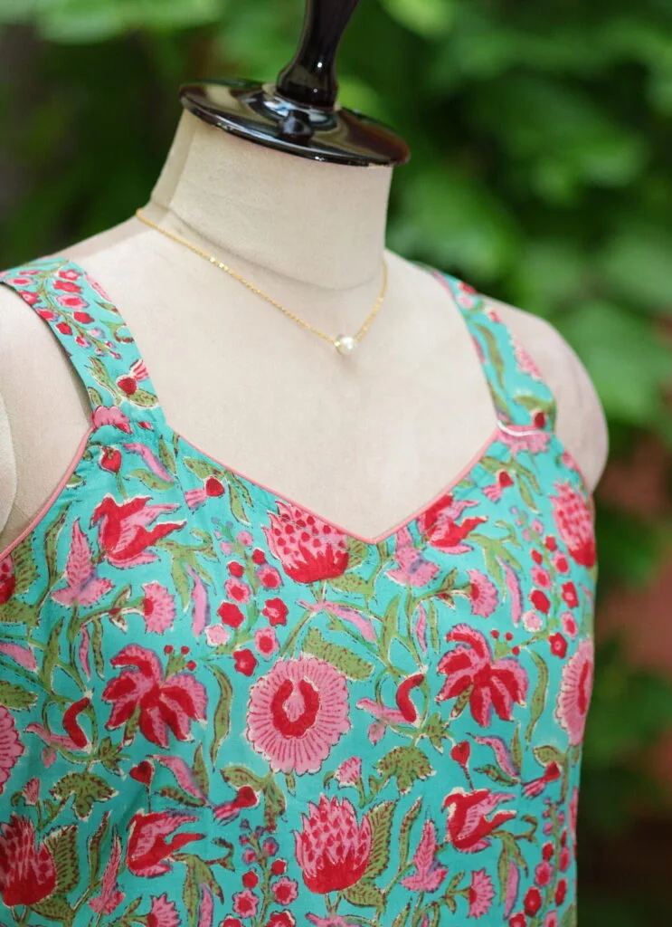 Sangeneri Noodles Strap Kurti – Kurti in Rama green, side view | Tilattama