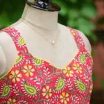 Sangeneri Noodles Strap Kurti – Kurti in Red, side view | Tilattama