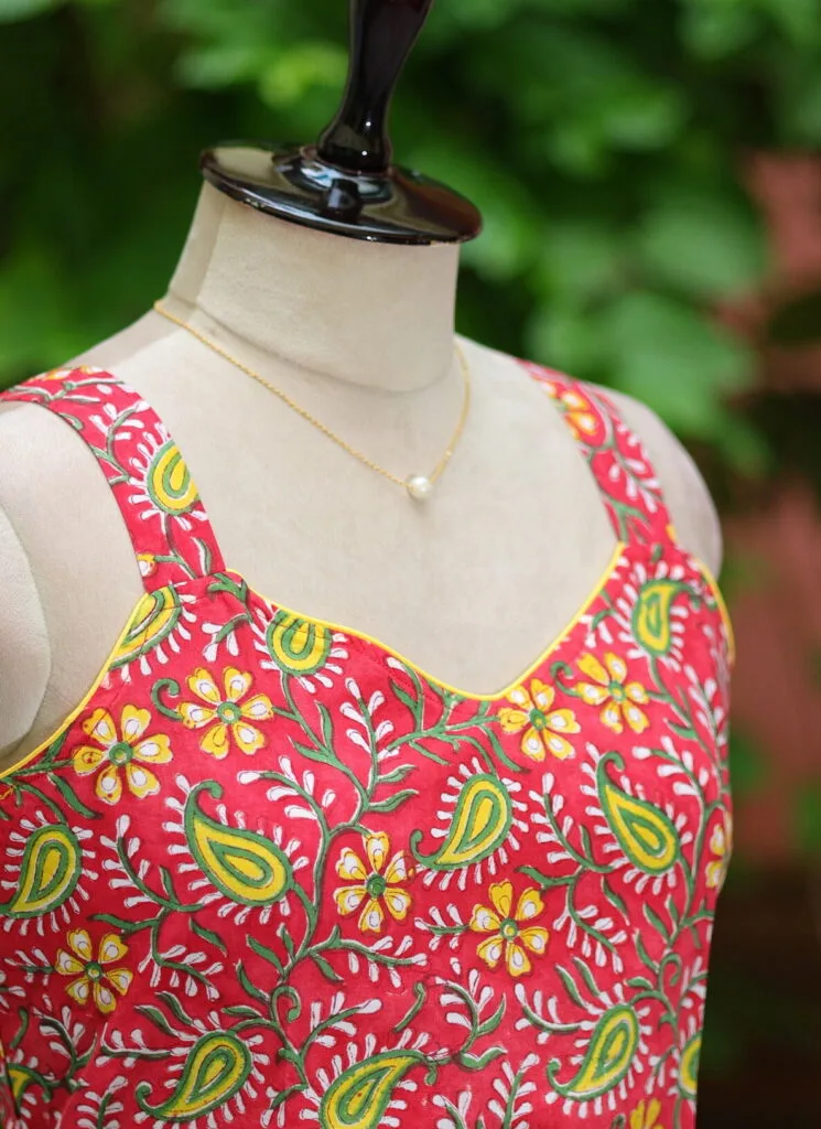 Sangeneri Noodles Strap Kurti – Kurti in Red, side view | Tilattama