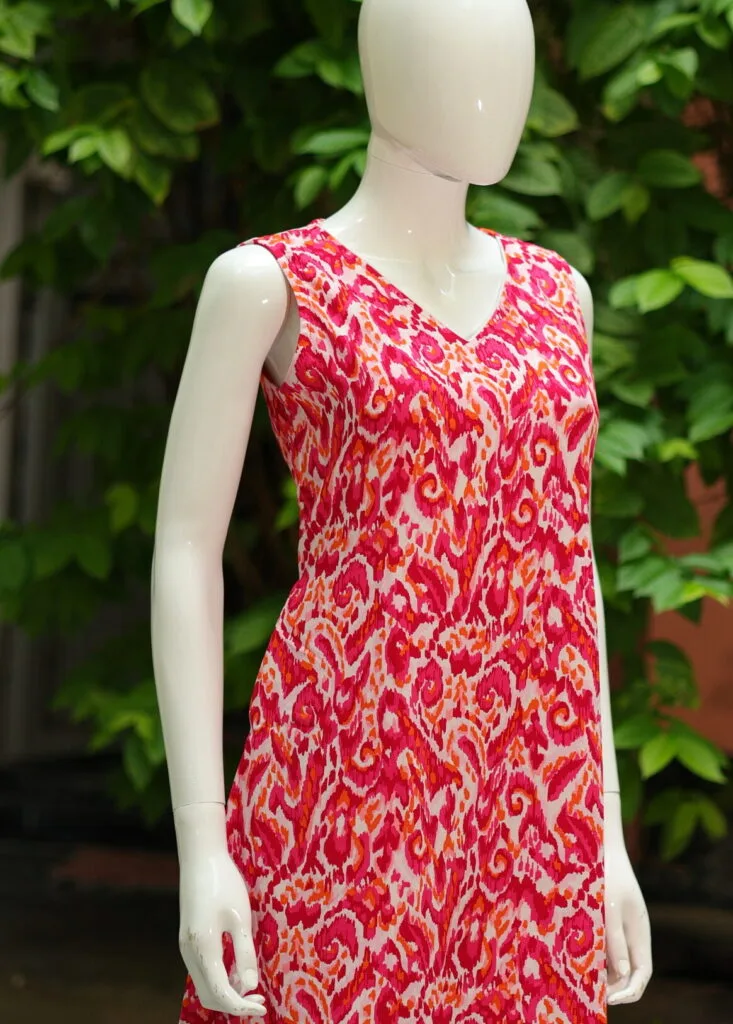 Blooming One Piece – Kurti in Rani, side view | Tilattama