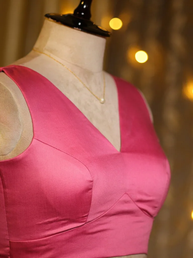 Sabyasachi Celebrity – Blouse in Fusia pink 38 Sleeveless, side view | Tilattama