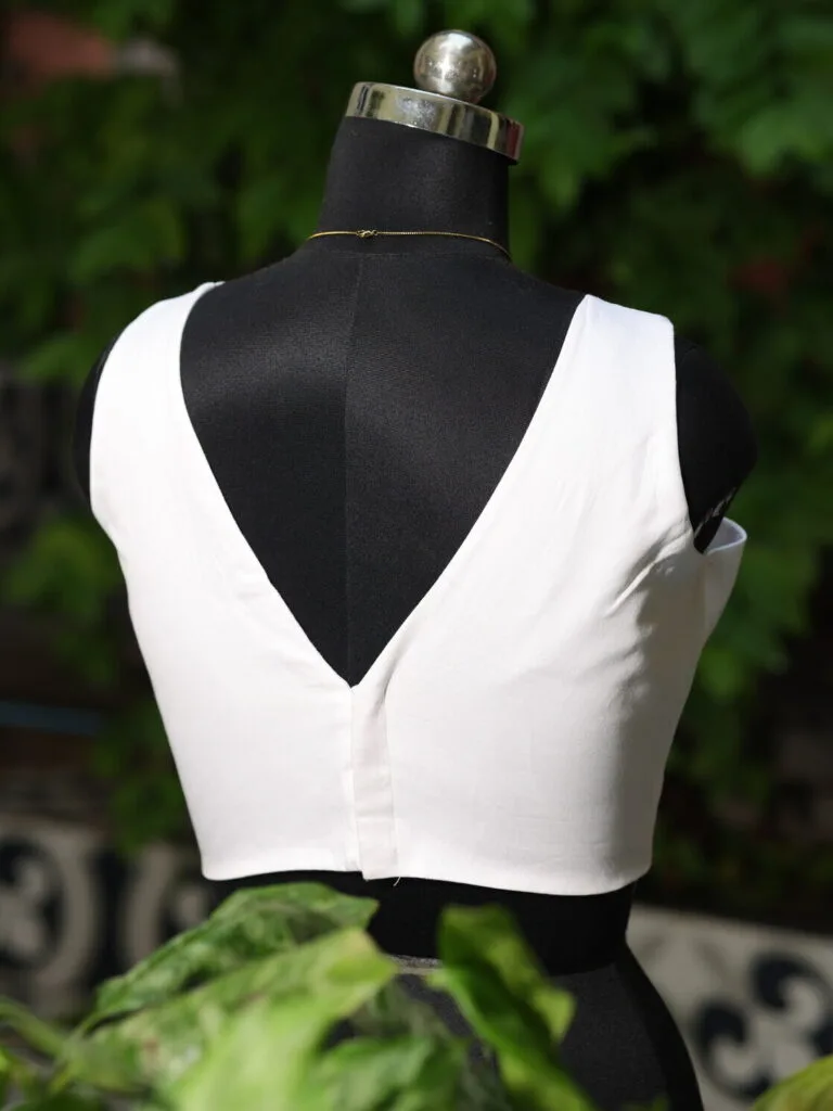Sabyasachi Celebrity – Blouse in Off white 38 Sleeveless, back view | Tilattama