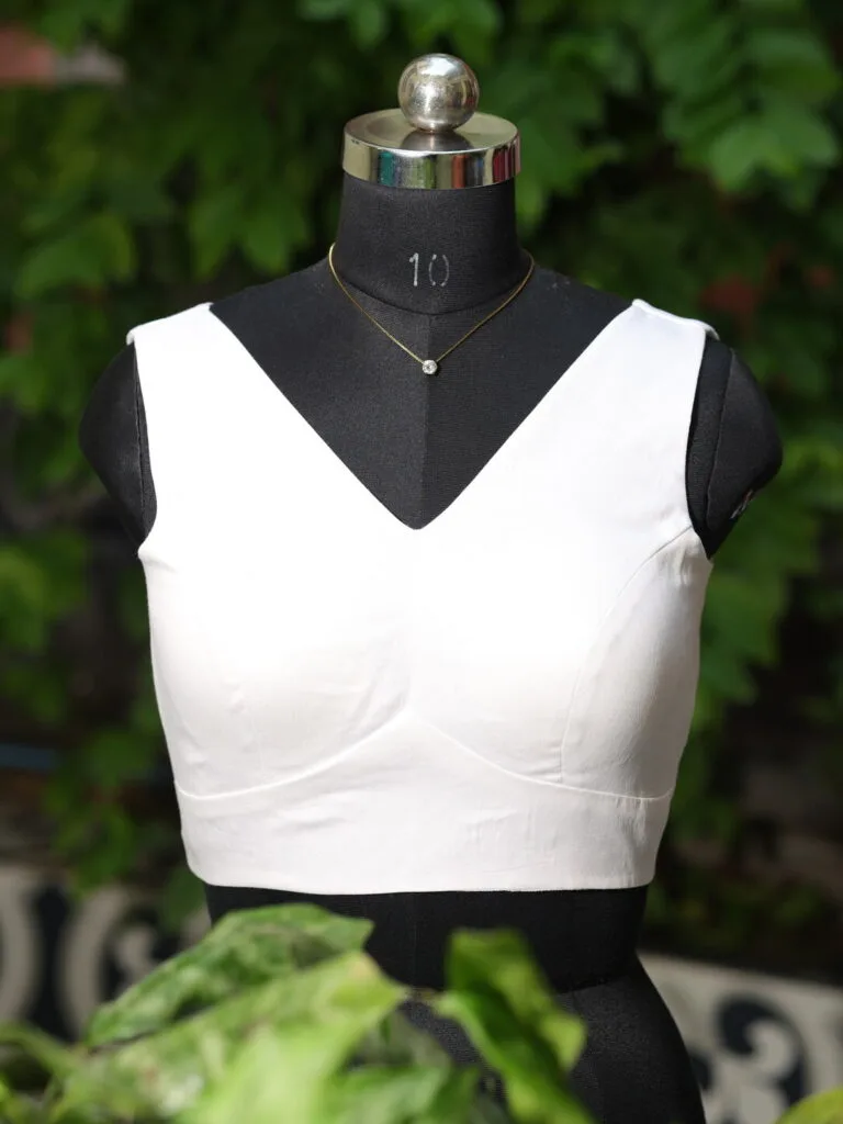 Sabyasachi Celebrity – Blouse in Off white 38 Sleeveless, front view | Tilattama