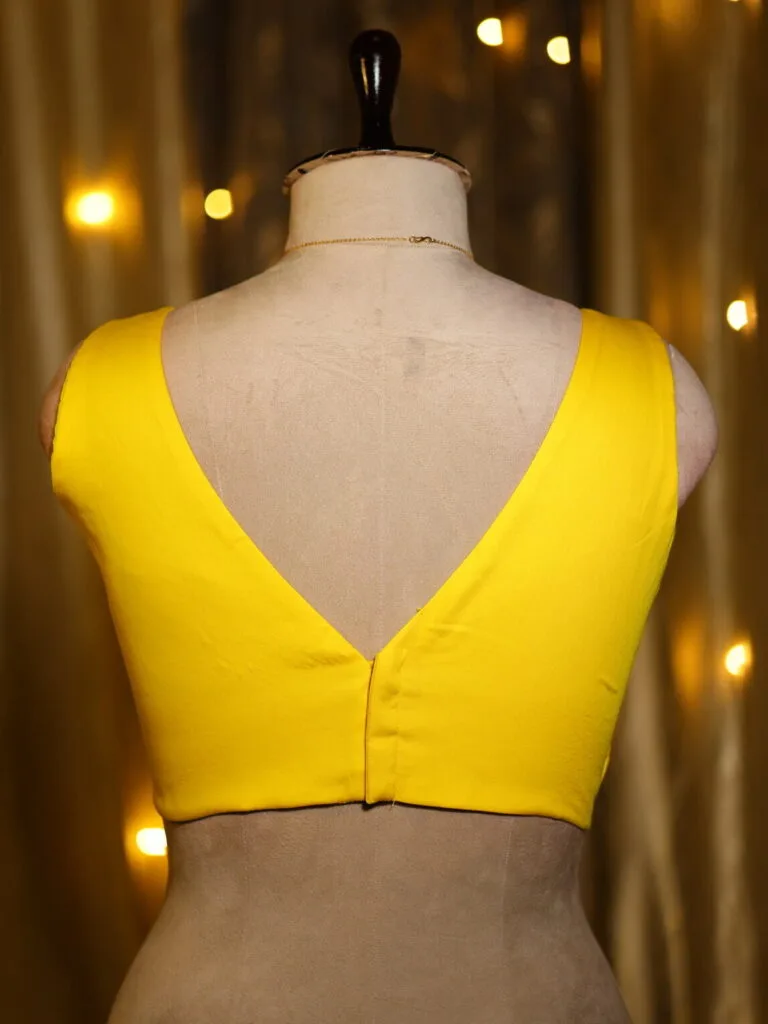 Sabyasachi Celebrity – Blouse in Yellow 44 Sleeveless, back view | Tilattama