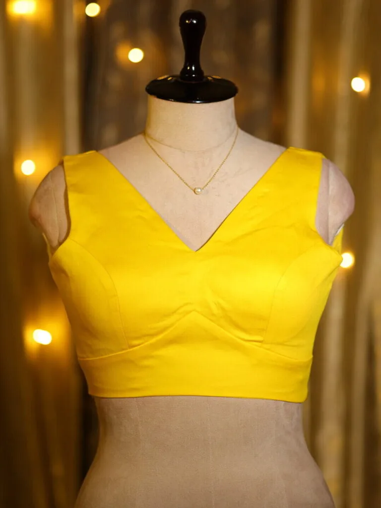 Sabyasachi Celebrity – Blouse in Yellow 44 Sleeveless, front view | Tilattama