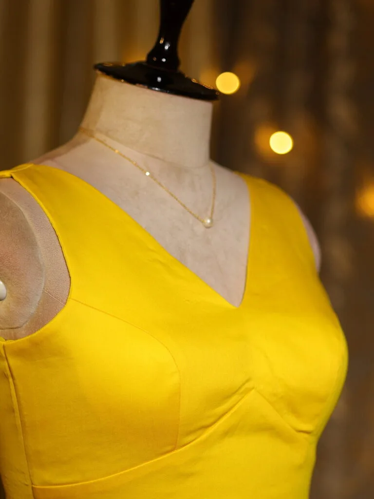 Sabyasachi Celebrity – Blouse in Yellow 44 Sleeveless, side view | Tilattama